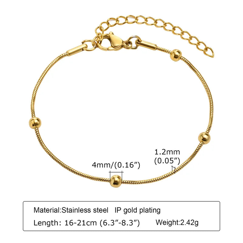 Gold Bracelet with Gold Round Stones